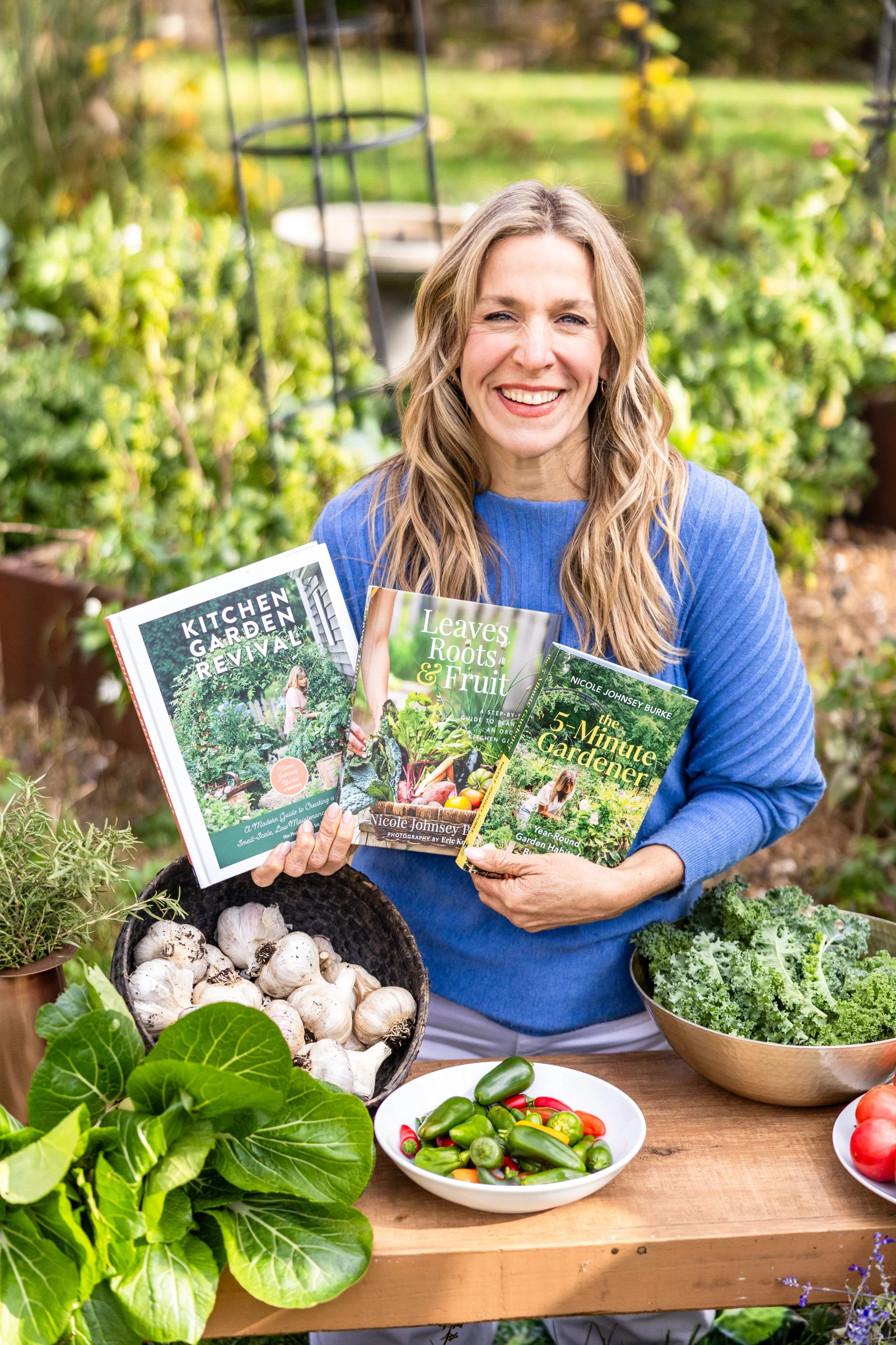 Nicole Burke with her three published books.