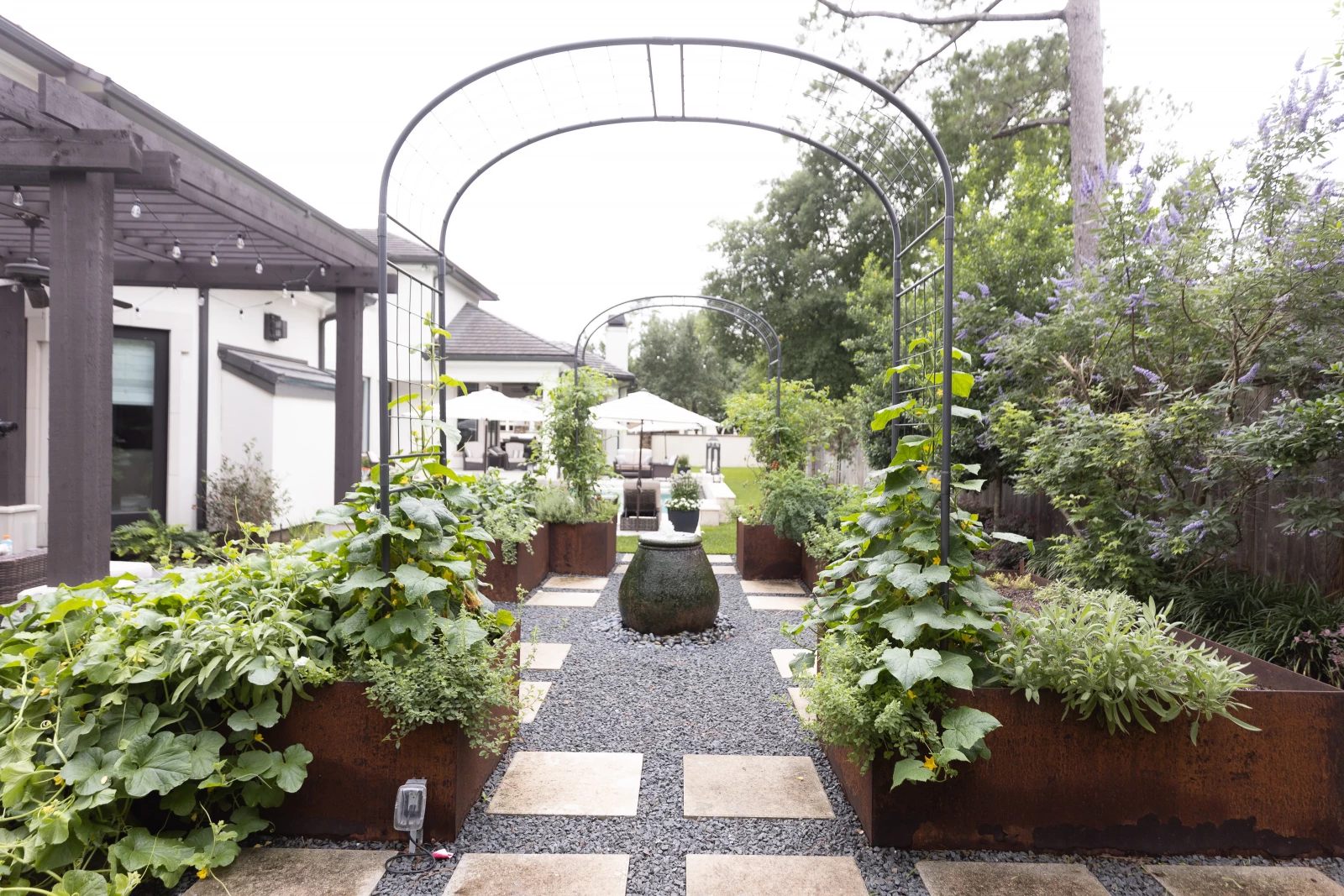 large kitchen garden with trellises